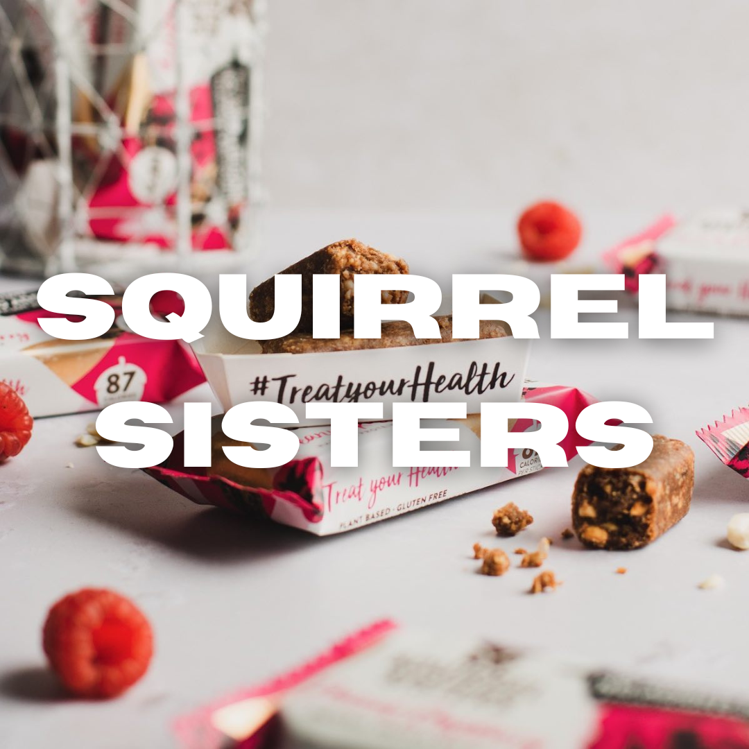 Blog post about female owned businesses written by Tide and Seek sustainable swimwear  - image of squirrel sisters healthy snack bars with the name squirrel sisters written across the image in white writing.