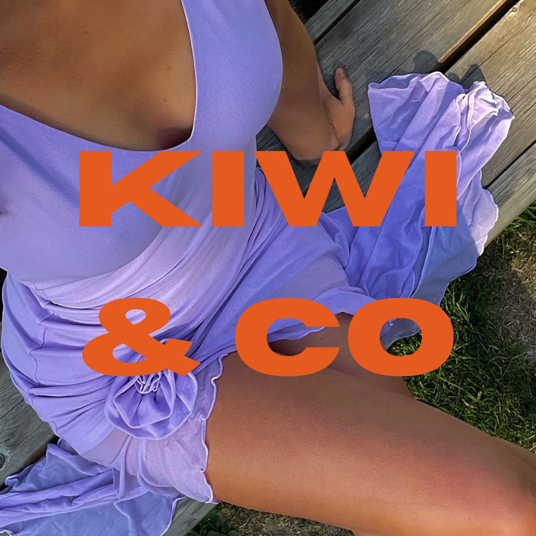 Blog Post of female owned businesses written by Tide + Seek Sustainable Swimwear - image of girl in lilac purple dress with her legs crossed with the writting 'Kiwi and Co' over the image in orange.