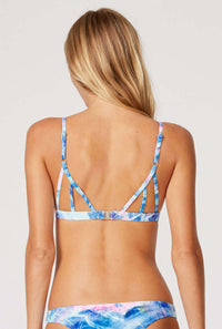 Tide + Seek Sustainable swimwear model wearing our Aqua Marble fixed triangle top and Cheeky Coverage Bikini Bottom