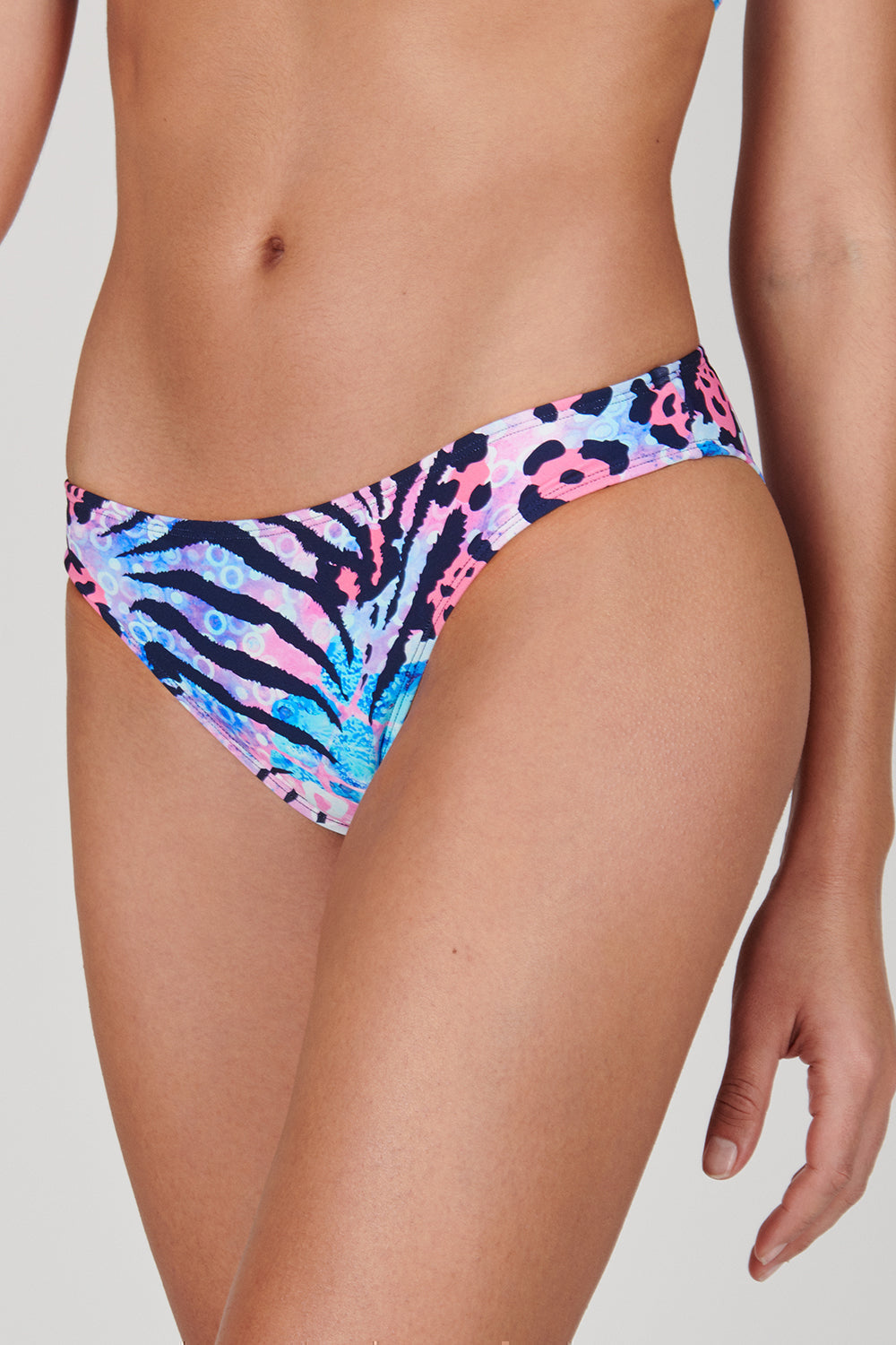 Tide + Seek Sustainable swimwear model wearing our Jungle Disco Classic Bikini Bottom
