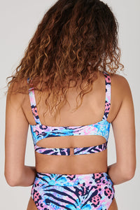 Tide + Seek Sustainable swimwear model wearing our Jungle Disco Fitness Bikini Top