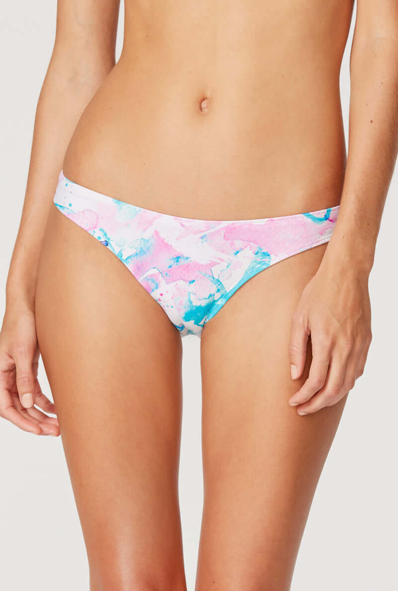 Tide + Seek Sustainable swimwear model wearing Popsicle Cheeky Coverage Bikini Bottom front view
