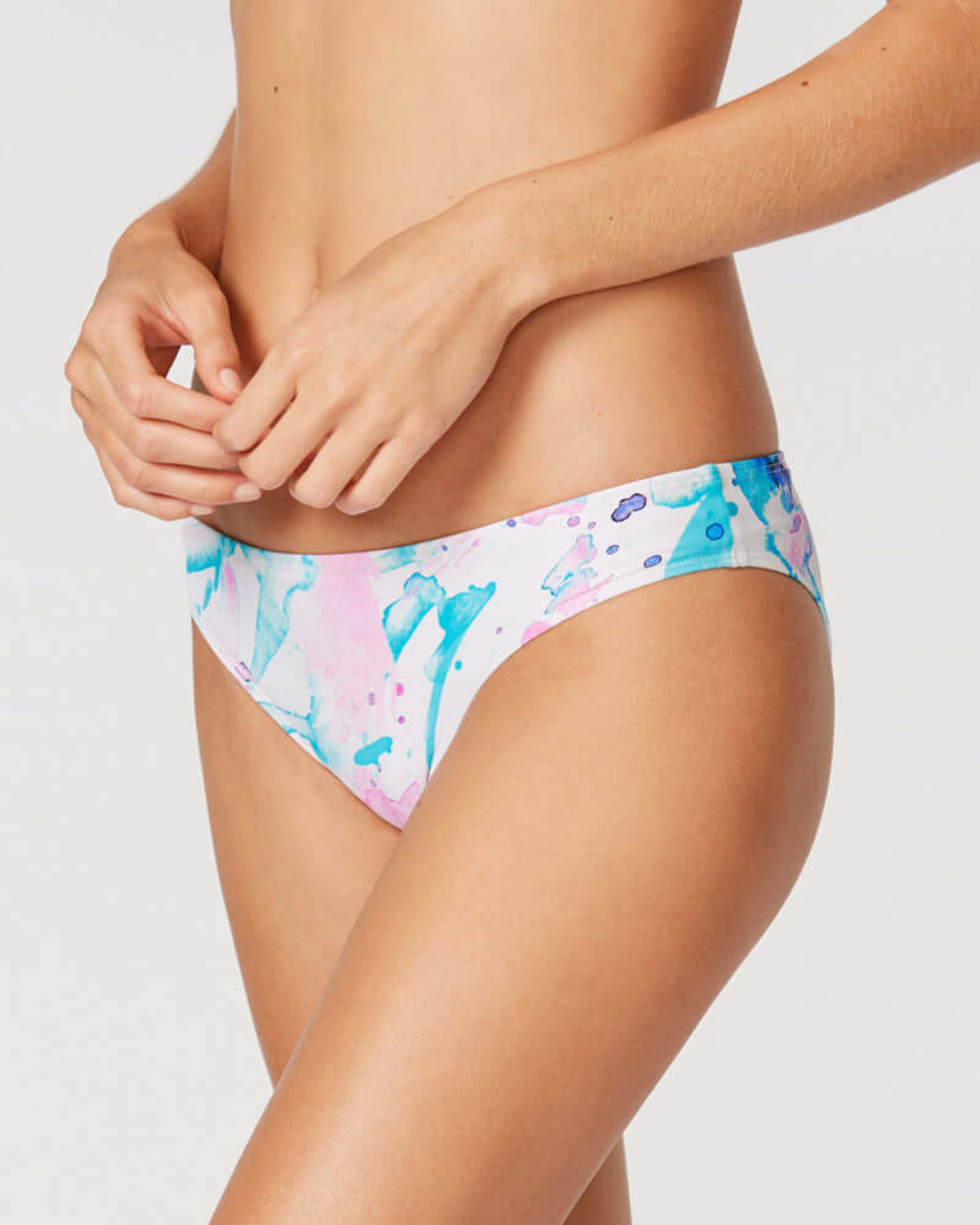 Tide + Seek Sustainable swimwear model wearing Popsicle Classic Cut Bikini Bottom front view
