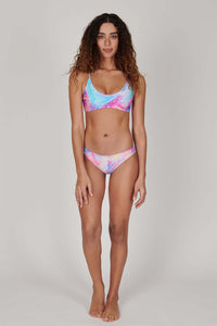Tide + Seek Sustainable swimwear model wearing our Rosie Woods X Tide + Seek Surf Bralette and Classic Bikini Bottoms