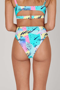 Tide + Seek Sustainable swimwear model wearing Saved By The Bell Fitness Bikini Top and High Waisted Bikini Bottoms