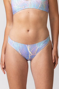 Tide and Seek sustainable swimwear model wearing holo daze classic cut bikini bottoms 
